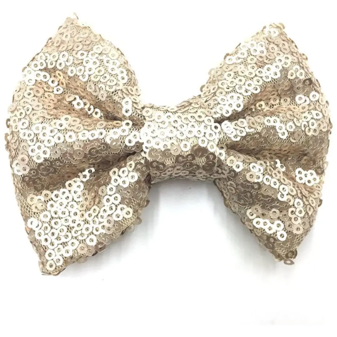 4-inch light gold sequin glitter hair bow clip, perfect for parties, special occasions, or everyday wear. Attached to a strong alligator clip for a secure hold.