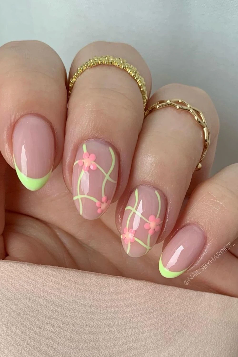 Flower nail designs are trendy, customizable, and easy to create using dotting tools and nail polish. While traditionally associated with spring, floral nail designs can be embraced year-round by adjusting color palettes to suit the summer, fall or winter. They work well on natural nails as well as acryllic, gel, or dip nails. You can also add rhinestones. Simple, short nails, french tips, almond, blue, pink, green, coffin, white, purple, cute, simple.