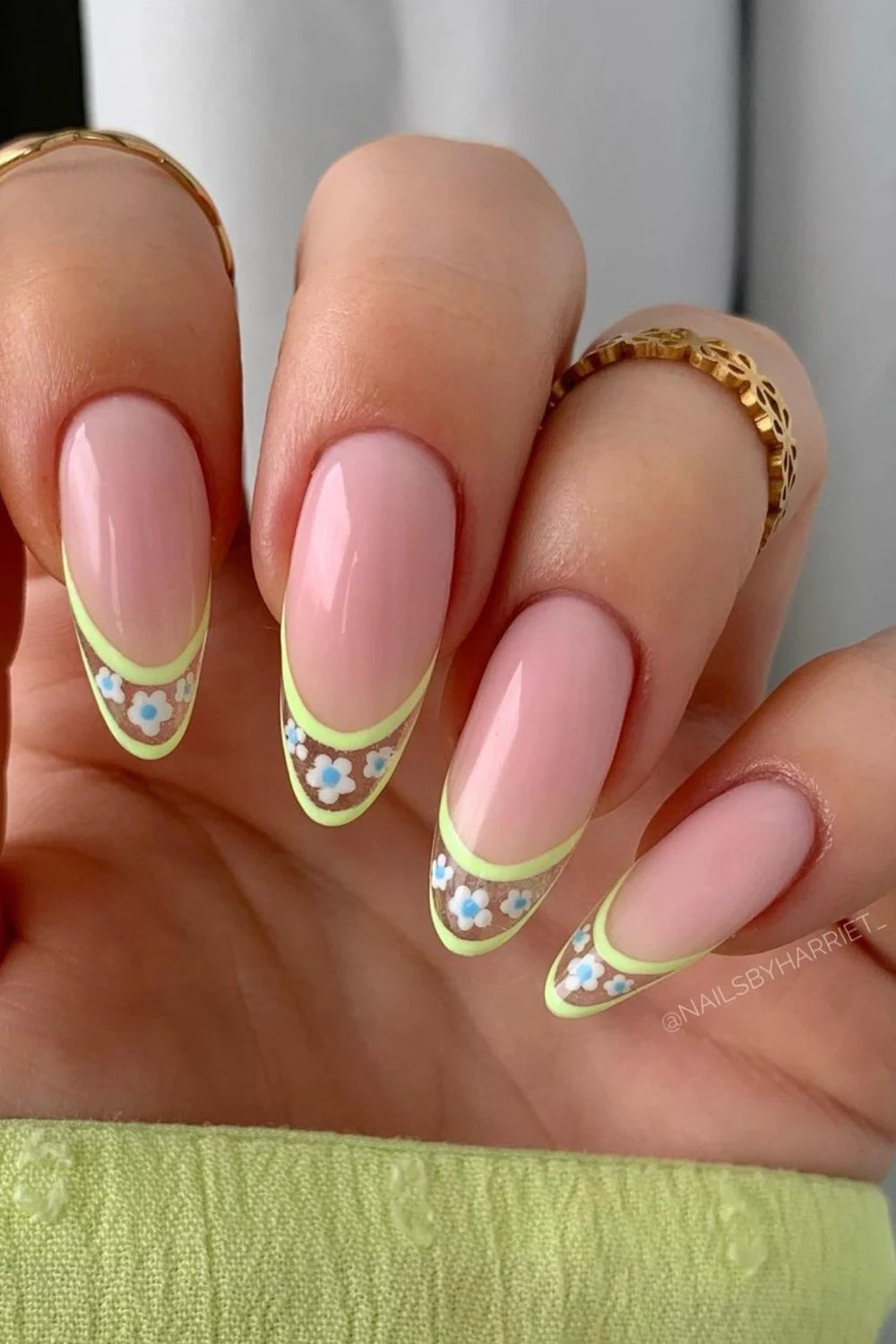 Flower nail designs are trendy, customizable, and easy to create using dotting tools and nail polish. While traditionally associated with spring, floral nail designs can be embraced year-round by adjusting color palettes to suit the summer, fall or winter. They work well on natural nails as well as acryllic, gel, or dip nails. You can also add rhinestones. Simple, short nails, french tips, almond, blue, pink, green, coffin, white, purple, cute, simple.