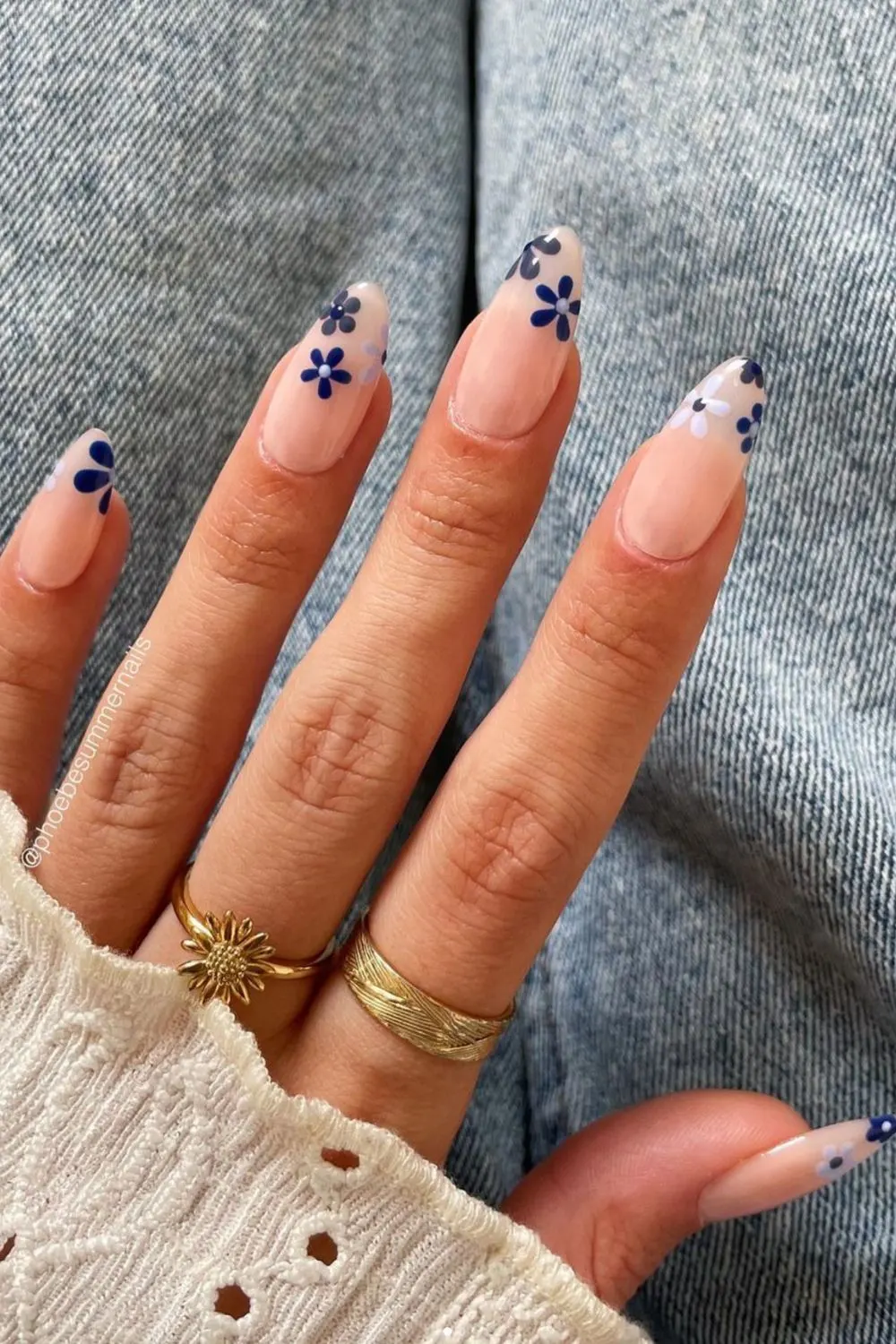 Flower nail designs are trendy, customizable, and easy to create using dotting tools and nail polish. While traditionally associated with spring, floral nail designs can be embraced year-round by adjusting color palettes to suit the summer, fall or winter. They work well on natural nails as well as acryllic, gel, or dip nails. You can also add rhinestones. Simple, short nails, french tips, almond, blue, pink, green, coffin, white, purple, cute, simple.