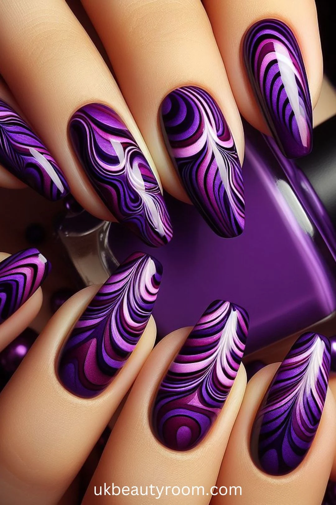 Purple nails are all the rage lately, as they exude elegance and versatility. From soft lavender hues to bold plum tones, purple nail designs offer a chic and stylish touch to any look.  This post lists 43 different purple nail designs to inspire your next manicure including: light, pink and, dark, simple, pastel, bling, short, almond, cute, blue and