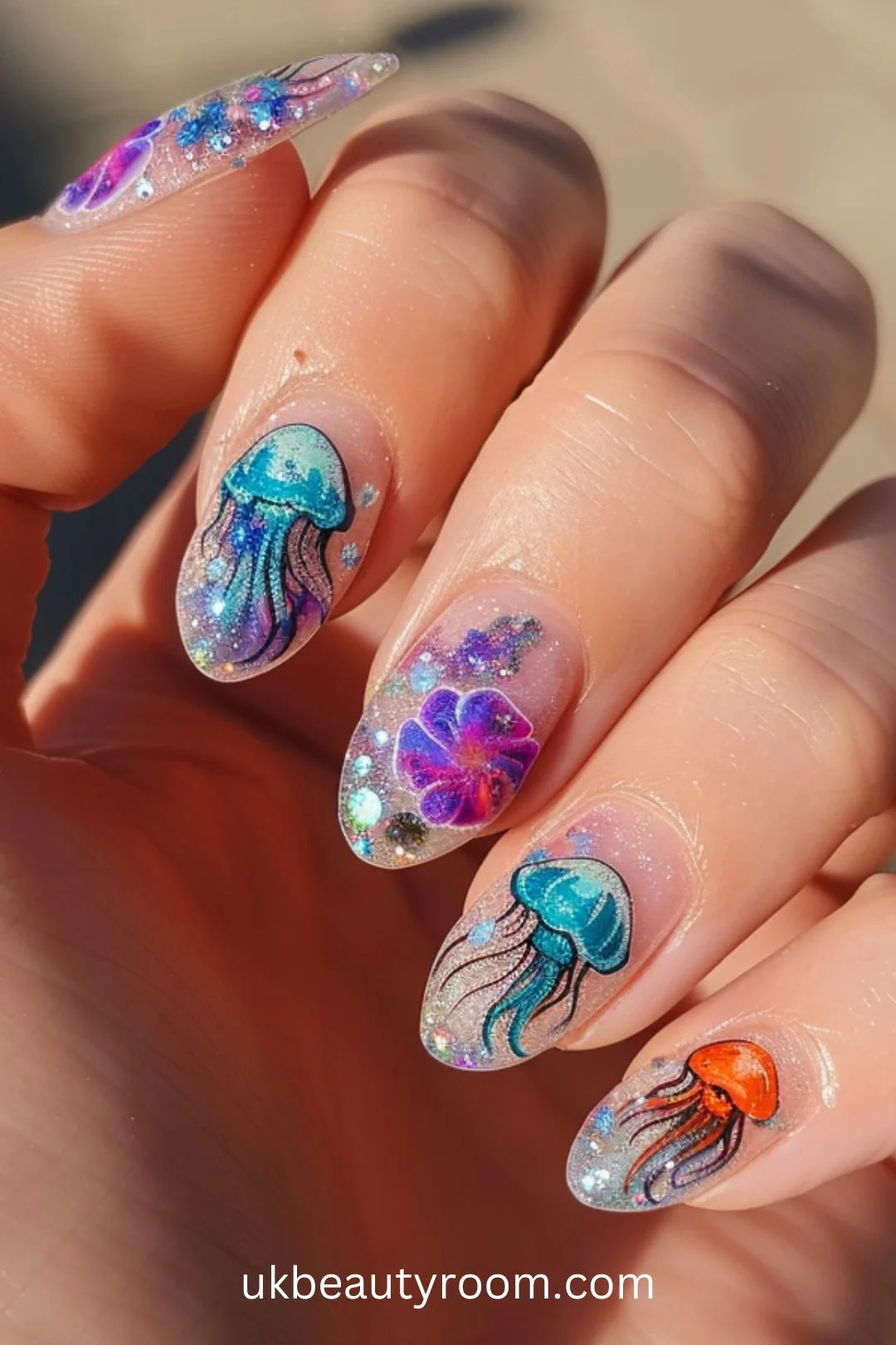 Beach nail designs are perfect for adding a fun and tropical touch to your summer look.  From ocean waves to tropical flowers, these 21 beach nail ideas capture the essence of beach vibes.  Vacations, summer, 2024, vacations almond, gel, ocean, simple, easy, acrylic, almond shape, square, short, blue, French tip.