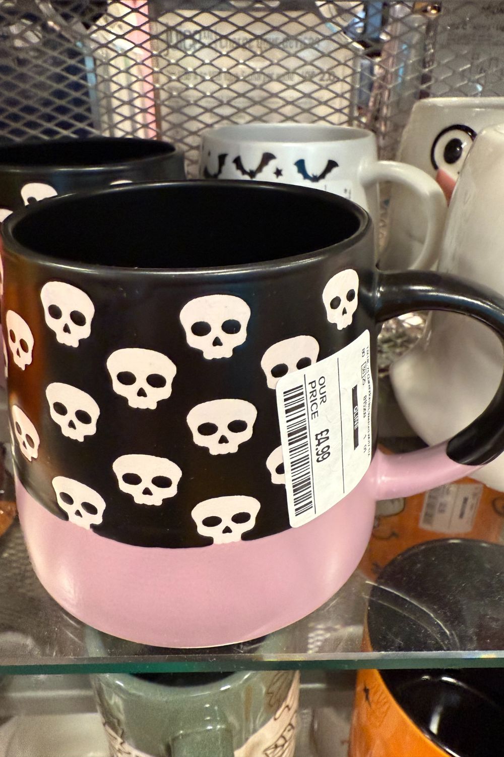 Black and pink Halloween mug with white skull pattern from TK Maxx.