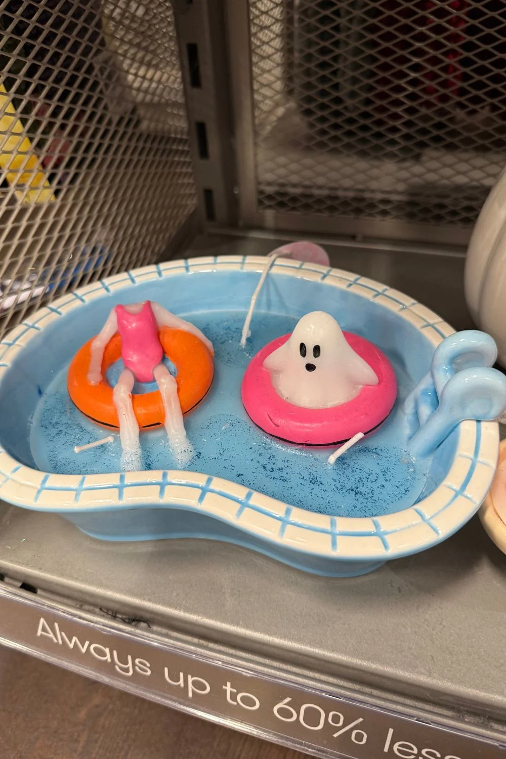 Halloween novelty pool candle with ghost and figure in pool floats from TK Maxx.