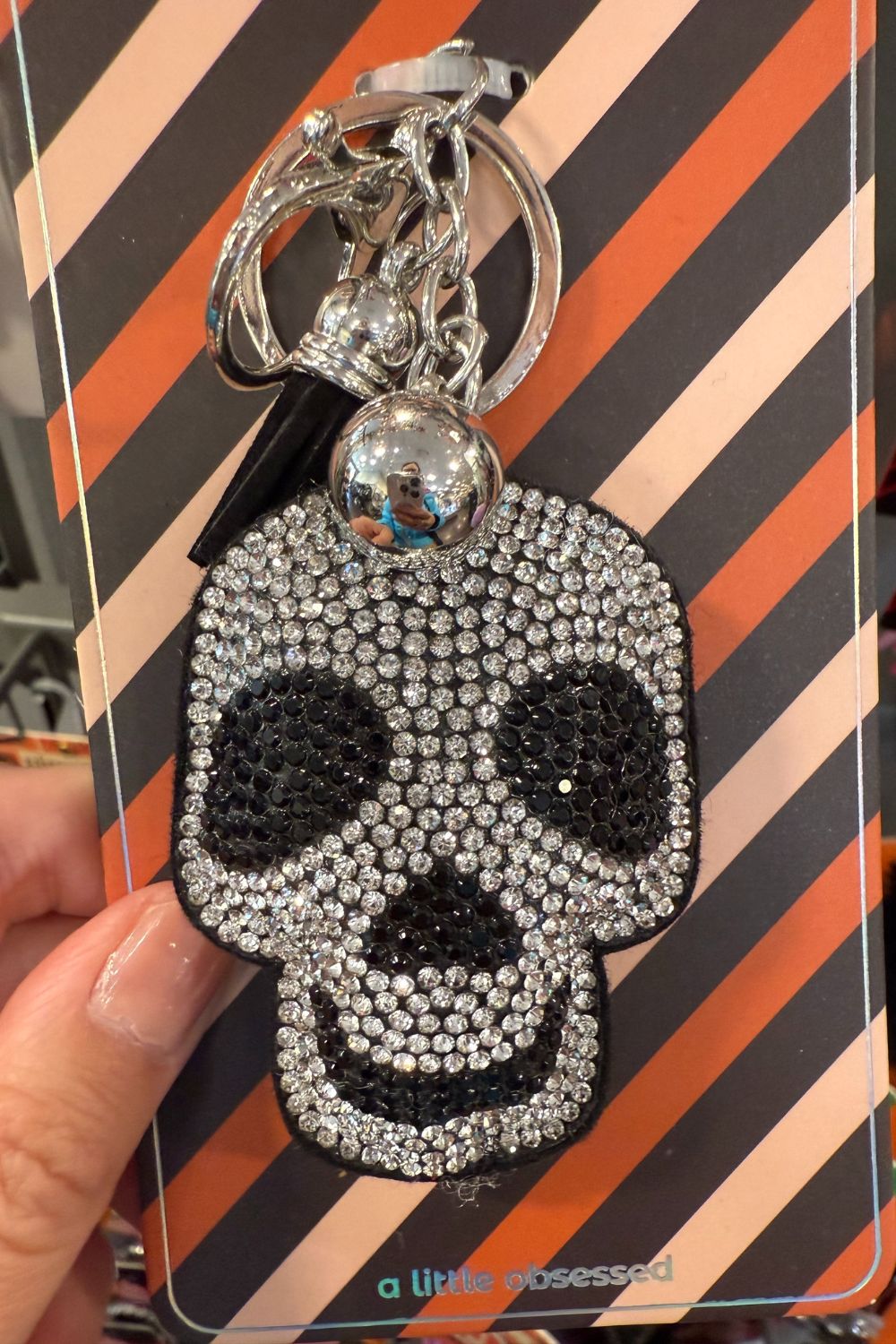Halloween bag charm with silver rhinestone skull and keyring.