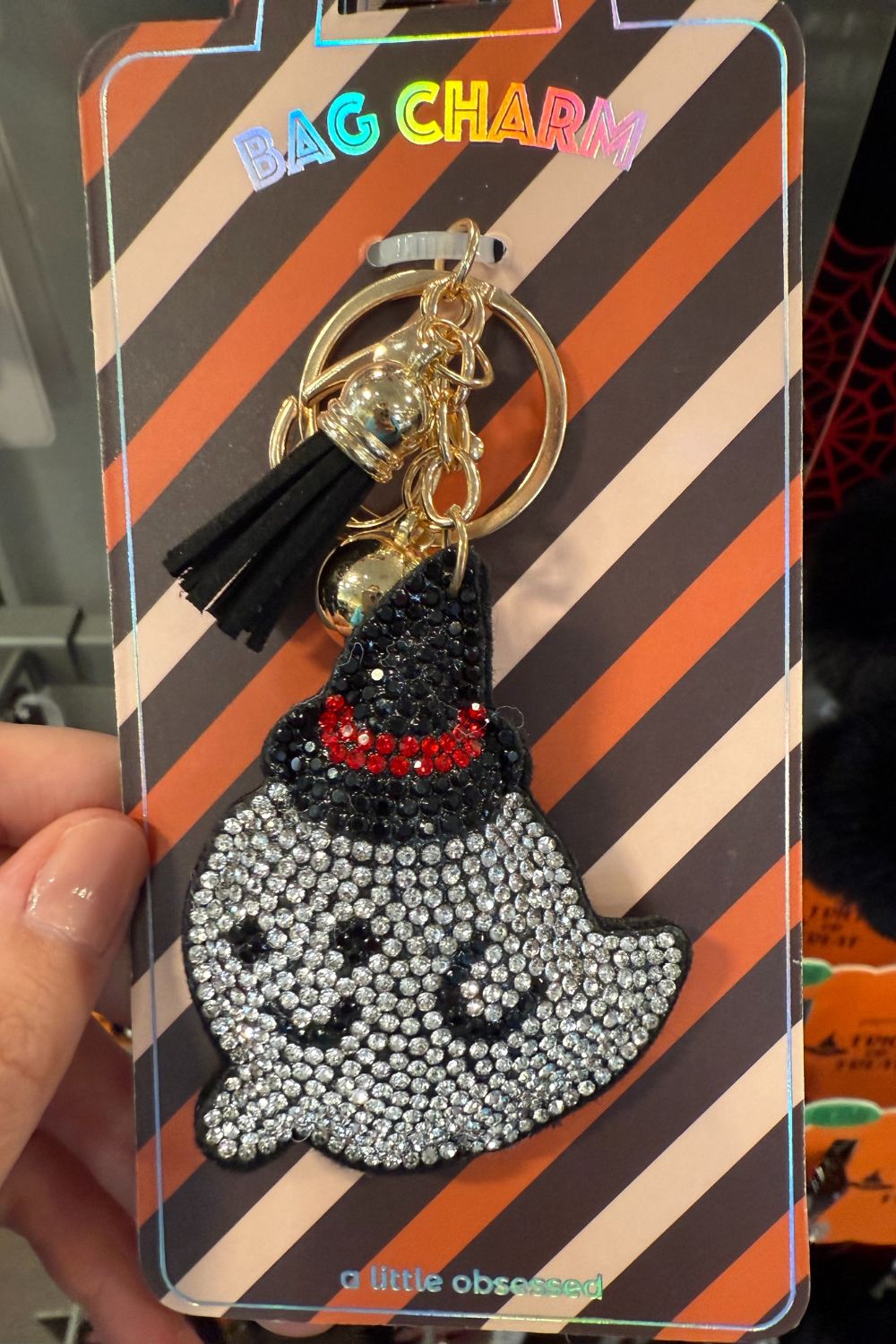 Sparkly rhinestone ghost bag charm with witch hat and tassel keychain.