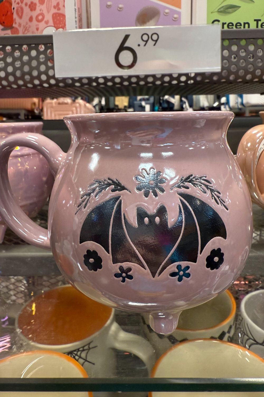 Pink cauldron-style Halloween mug with bat and floral design from TK Maxx.